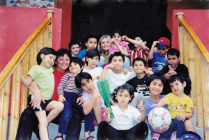 A group of children posing for the camera.