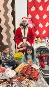Santa Claus with children during festivities.